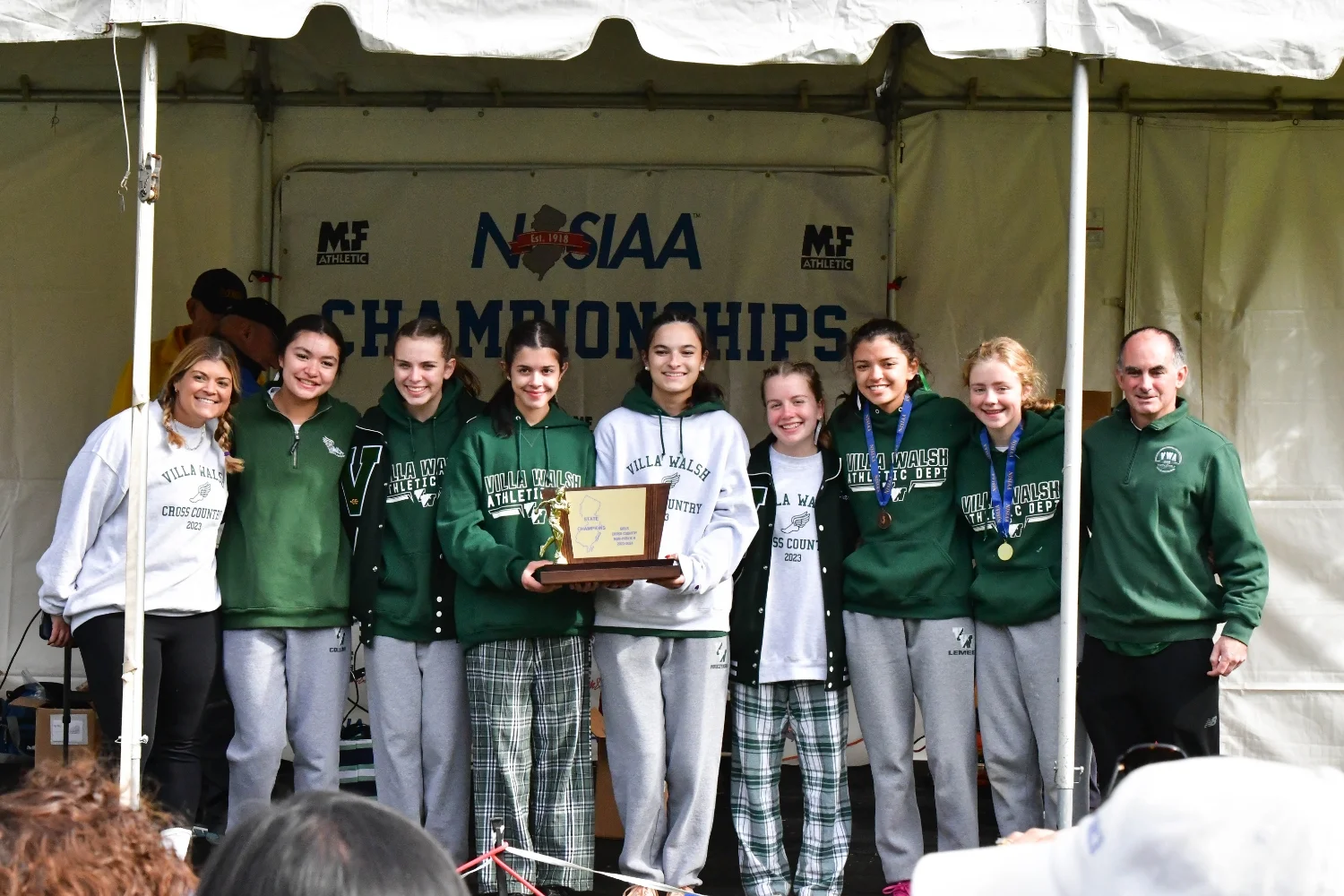 Cross Country team accepting award