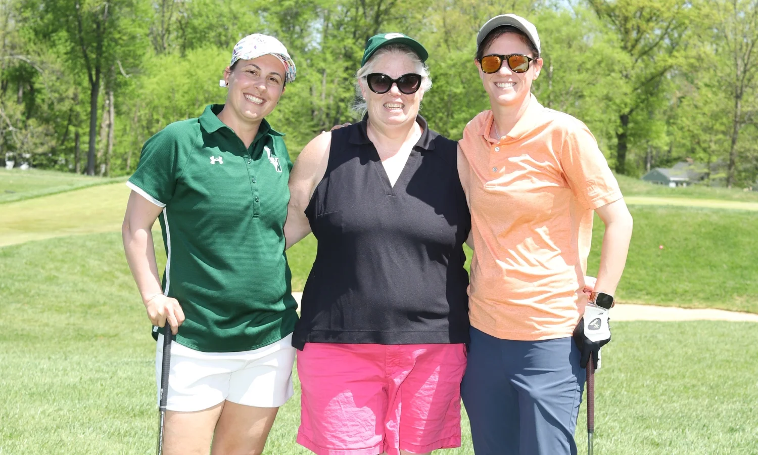 3 VWA staff members on the green