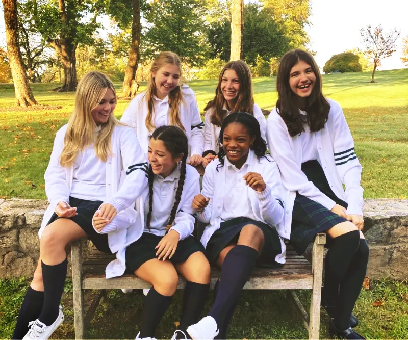 students sitting and laughing together